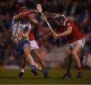 2 April 2022; Carthach Daly of Waterford is tackled by Darragh Fitzgibbon, left, and Ger Millerick of Cork during the Allianz Hurling League Division 1 Final match between Cork and Waterford at FBD Semple Stadium in Thurles, Tipperary. Photo by Ray McManus/Sportsfile