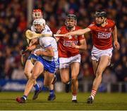 2 April 2022; Neil Montgomery of Waterford is tackled by Robert Downey, 7, and Darragh Fitzgibbon of Cork during the Allianz Hurling League Division 1 Final match between Cork and Waterford at FBD Semple Stadium in Thurles, Tipperary. Photo by Ray McManus/Sportsfile