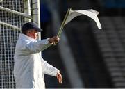 2 April 2022; An umpire waves a white flag, to indicate a point scored, during the Allianz Hurling League Division 2A Final match between Down and Westmeath at FBD Semple Stadium in Thurles, Tipperary. Photo by Ray McManus/Sportsfile