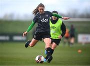 6 April 2022; Kyra Carusa in action against Harriet Scott, right, during a Republic of Ireland women training session at the FAI National Training Centre in Abbotstown, Dublin. Photo by Stephen McCarthy/Sportsfile