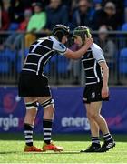 6 April 2022; Fionn Higgins of Cistercian College, Roscrea, right, is consoled by teammate Billy Hayes during the Bank of Ireland Leinster Rugby Schools Junior Cup Final match between St Michael’s College and Cistercian College, Roscrea at Energia Park in Dublin. Photo by Seb Daly/Sportsfile