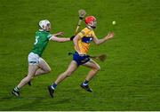 6 April 2022; Jack Kirwan of Clare in action against Fergal O’Connor of Limerick during the 2022 oneills.com Munster GAA Hurling Under 20 Championship Group 1 Round 1 match between Limerick and Clare at TUS Gaelic Grounds in Limerick. Photo by Piaras Ó Mídheach/Sportsfile