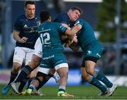 8 April 2022; Tadhg Furlong of Leinster is tackled by Bundee Aki and Dave Heffernan of Connacht during the Heineken Champions Cup Round of 16 First Leg match between Connacht and Leinster at the Sportsground in Galway. Photo by Harry Murphy/Sportsfile