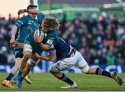 8 April 2022; Cian Prendergast of Connacht is tackled by Caelan Doris of Leinster during the Heineken Champions Cup Round of 16 first leg match between Connacht and Leinster at the Sportsground in Galway. Photo by Brendan Moran/Sportsfile