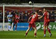 8 April 2022; Luke Byrne, right, and Kameron Ledwidge of Shelbourne celebrate their side's first goal, scored by teammate Shane Farrell, not pictured, during the SSE Airtricity League Premier Division match between Shelbourne and Shamrock Rovers at Tolka Park in Dublin. Photo by Seb Daly/Sportsfile