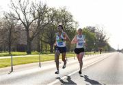 9 April 2022; Michael Clohisey of Raheny Shamrock AC, Dublin, left, and Jamie Fallon of Craughwell AC, Galway, during the Great Ireland Run incorporating the National 10k Championships at Phoenix Park in Dublin. Photo by Eóin Noonan/Sportsfile