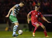 8 April 2022; Aaron Greene of Shamrock Rovers in action against Daniel Hawkins of Shelbourne during the SSE Airtricity League Premier Division match between Shelbourne and Shamrock Rovers at Tolka Park in Dublin. Photo by Seb Daly/Sportsfile