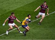 3 April 2022; Donie Smith of Roscommon in action against Seán Fitzgerald, left, and Liam Silke of Galway during the Allianz Football League Division 2 Final match between Roscommon and Galway at Croke Park in Dublin. Photo by Piaras Ó Mídheach/Sportsfile