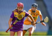 9 April 2022; Anais Curran of Wexford gets away from Niamh Donnelly of Antrim during the Littlewoods Ireland Camogie League Division 2 Final match between Antrim and Wexford at Croke Park in Dublin. Photo by Piaras Ó Mídheach/Sportsfile