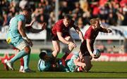 9 April 2022; Mike Haley of Munster is tackled by Tom O'Flaherty of Exeter Chiefs during the Heineken Champions Cup Round of 16 first leg match between Exeter Chiefs and Munster at Sandy Park in Exeter, England. Photo by Harry Murphy/Sportsfile