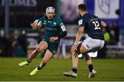 8 April 2022; Mack Hansen of Connacht in action against Robbie Henshaw of Leinster during the Heineken Champions Cup Round of 16 first leg match between Connacht and Leinster at the Sportsground in Galway. Photo by Brendan Moran/Sportsfile