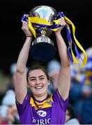 9 April 2022; Wexford captain Sarah O'Connor lifts the cup after her side's victory in the Littlewoods Ireland Camogie League Division 2 Final match between Antrim and Wexford at Croke Park in Dublin. Photo by Piaras Ó Mídheach/Sportsfile