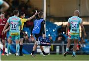 9 April 2022; Olly Woodburn of Exeter Chiefs, right, is shown a yellow card by referee Pierre Brousset during the Heineken Champions Cup Round of 16 first leg match between Exeter Chiefs and Munster at Sandy Park in Exeter, England. Photo by Harry Murphy/Sportsfile