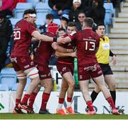 9 April 2022; Shane Daly of Munster, second from right, celebrates with teammates Thomas Ahern, John Hodnett and Chris Farrell after scoring their side's first try during the Heineken Champions Cup Round of 16 first leg match between Exeter Chiefs and Munster at Sandy Park in Exeter, England. Photo by Harry Murphy/Sportsfile