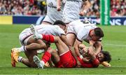 9 April 2022; Romain Ntamack of Toulouse is tackled by James Hume and Robert Baloucoune of Ulster during the Heineken Champions Cup Round of 16 first leg match between Toulouse and Ulster at Stade Ernest Wallon in Toulouse, France. Photo by Manuel Blondeau/Sportsfile