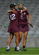 9 April 2022; Galway players Tara Kenny, right, and Aoife Donohue celebrate after their side's victory in the Littlewoods Ireland Camogie League Division 1 Final match between Cork and Galway at Croke Park in Dublin. Photo by Piaras Ó Mídheach/Sportsfile