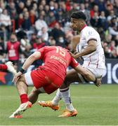 9 April 2022; Robert Baloucoune of Ulster is tackled by Thomas Ramos of Toulouse during the Heineken Champions Cup Round of 16 first leg match between Toulouse and Ulster at Stade Ernest Wallon in Toulouse, France. Photo by John Dickson/Sportsfile