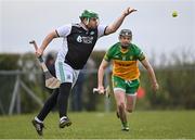10 April 2022; Fermanagh goalkeeper Mark Curry clears under pressure from Declan Coulter of Donegal during the Nickey Rackard Cup Round 1 match between Fermanagh and Donegal at St Mary's GAA Club in Maguiresbridge, Fermanagh. Photo by Ramsey Cardy/Sportsfile