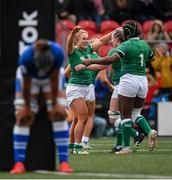 10 April 2022; Neve Jones of Ireland celebrates with Linda Djougang, right, after scoring their side's second try which was subsequently disallowed during the Tik Tok Women's Six Nations Rugby Championship match between Ireland and Italy at Musgrave Park in Cork. Photo by Eóin Noonan/Sportsfile