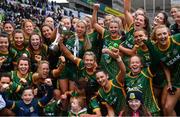 10 April 2022; Meath players and backroom team celebrate after their side's victory in the Lidl Ladies Football National League Division 1 Final between Donegal and Meath at Croke Park in Dublin. Photo by Piaras Ó Mídheach/Sportsfile