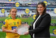 10 April 2022; Niamh McLaughlin of Donegal is presented with the Player of the Match by Lidl Ireland and Northern Ireland director of communications Aoife Clarke after the Lidl Ladies Football National League Division 1 Final between Donegal and Meath at Croke Park in Dublin. Photo by Brendan Moran/Sportsfile