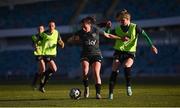10 April 2022; Jessica Ziu is tackled by Izzy Atkinson during a Republic of Ireland women training session at the Gamla Ullevi Stadium in Gothenburg, Sweden. Photo by Stephen McCarthy/Sportsfile