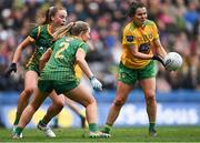 10 April 2022; Geraldine McLaughlin of Donegal in action against Meath players Katie Newe, 2, and Aoibhín Cleary during the Lidl Ladies Football National League Division 1 Final between Donegal and Meath at Croke Park in Dublin. Photo by Piaras Ó Mídheach/Sportsfile