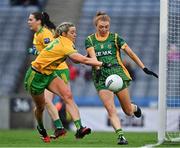 10 April 2022; Aoibheann Leahy of Meath clears under pressure from Yvonne Bonner of Donegal during the Lidl Ladies Football National League Division 1 Final between Donegal and Meath at Croke Park in Dublin. Photo by Brendan Moran/Sportsfile