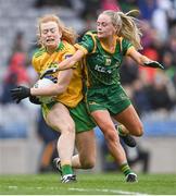 10 April 2022; Evelyn McGinley of Donegal in action against Megan Thynne of Meath during the Lidl Ladies Football National League Division 1 Final between Donegal and Meath at Croke Park in Dublin. Photo by Piaras Ó Mídheach/Sportsfile
