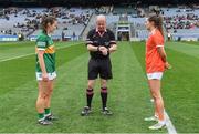 10 April 2022; Referee Jonathan Murphy performs the coin toss in the company of team captains Anna Galvin of Kerry, left, and Aimee Mackin of Armagh before the Lidl Ladies Football National League Division 2 Final between Armagh and Kerry at Croke Park in Dublin. Photo by Brendan Moran/Sportsfile