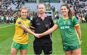10 April 2022; Team captains Niamh McLaughlin of Donegal, left, and Shauna Ennis of Meath shake hands in the company of referee Garryowen McMahon before the Lidl Ladies Football National League Division 1 Final between Donegal and Meath at Croke Park in Dublin. Photo by Brendan Moran/Sportsfile