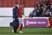 8 April 2022; Adam Murphy of St Patrick's Athletic leaves the pitch with an injury during the SSE Airtricity League Premier Division match between St Patrick's Athletic and Dundalk at Richmond Park in Dublin. Photo by Ramsey Cardy/Sportsfile