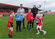 11 April 2022; LOITV pundits Gavin Peers, left, and Alan Keane, with Sligo Rovers supporters, from left, Harry O'Grady, age 7, Ronan McNally, age 10, Teddy Helion, age 10, Gloria Helion, age 7, Luke Foley, age 7, during a LOITV media event at The Showgrounds in Sligo. Photo by Ramsey Cardy/Sportsfile