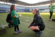 11 April 2022; Republic of Ireland's Louise Quinn speaks with supporter Annie Mulholland, from Newbridge, Kildare, who celebrated her 7th birthday on Sunday and was invited by the FAI to visit the Republic of Ireland team's training session at Gamla Ullevi in Gothenburg, Sweden. Photo by Stephen McCarthy/Sportsfile