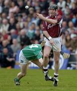 25 April 2004; Eugene Cloonan, Galway, in action against Eoin O'Neill, Limerick. Allianz Hurling League 2004, Round 3, Division 1, Galway v Limerick, Pearse Stadium, Galway. Picture credit; Ray McManus / SPORTSFILE *EDI*