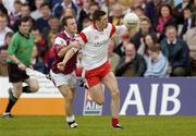 25 April 2004; Sean Cavanagh, Tyrone, in action against Derek Savage, Galway. Allianz Football League 2004, Semi-Final Replay, Galway v Tyrone, Pearse Stadium, Galway. Picture credit; Brian Lawless / SPORTSFILE *EDI*