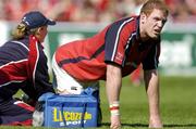 25 April 2004; Paul O'Connell, Munster, receives attention from team physio Kirsty Peacock. Heineken European Cup 2003-2004, Semi-Final, Munster v London Wasps, Lansdowne Road, Dublin. Picture credit; Brendan Moran / SPORTSFILE *EDI*