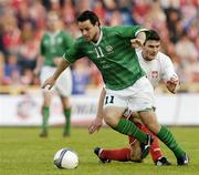 28 April 2004; Andy Reid, Republic of Ireland, in action against Michal Zewlakow, Poland. Friendly International, Poland v Republic of Ireland, Bydgoszcz, Poland. Picture credit; David Maher / SPORTSFILE *EDI*