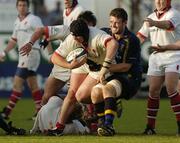 7 May 2004; Matt Mustchin, Ulster, is tackled by Aidan McCullen, Leinster Lions. Celtic League 2003-2004, Division 1, Ulster v Leinster Lions, Ravenhill, Belfast. Picture credit; Matt Browne / SPORTSFILE *EDI*