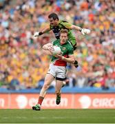 4 August 2013; Donal Vaughan, Mayo, on his way to scoring his side's second goal despite the tackle of Donegal goalkeeper Paul Durcan. GAA Football All-Ireland Senior Championship, Quarter-Final, Mayo v Donegal, Croke Park, Dublin. Picture credit: Stephen McCarthy / SPORTSFILE