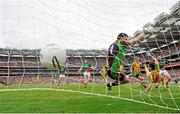 4 August 2013; Cillian O'Connor, Mayo, right, scores his side's fourth goal past Donegal goalkeeper Paul Durcan. GAA Football All-Ireland Senior Championship, Quarter-Final, Mayo v Donegal, Croke Park, Dublin. Picture credit: Stephen McCarthy / SPORTSFILE