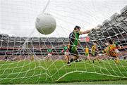 4 August 2013; Cillian O'Connor, Mayo, partially hidden, right, scores his side's fourth goal past Donegal goalkeeper Paul Durcan. GAA Football All-Ireland Senior Championship, Quarter-Final, Mayo v Donegal, Croke Park, Dublin. Picture credit: Stephen McCarthy / SPORTSFILE
