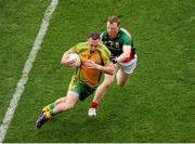 4 August 2013; Martin McElhiney, Donegal, in action against Colm Boyle, Mayo. GAA Football All-Ireland Senior Championship, Quarter-Final, Mayo v Donegal, Croke Park, Dublin. Picture credit: Dáire Brennan / SPORTSFILE