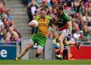 4 August 2013; Martin McElhinney, Donegal, in action against Keith Higgins, Mayo. GAA Football All-Ireland Senior Championship, Quarter-Final, Mayo v Donegal, Croke Park, Dublin. Photo by Sportsfile