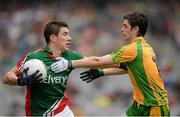 4 August 2013; Alan Freeman, Mayo, is tackled by Ryan McHugh, Donegal. GAA Football All-Ireland Senior Championship, Quarter-Final, Mayo v Donegal, Croke Park, Dublin. Picture credit: Ray McManus / SPORTSFILE