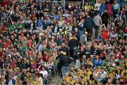 4 August 2013; Donegal supporters, in the Hogan Stand, start to leave after Mayo's fourth goal. GAA Football All-Ireland Senior Championship, Quarter-Final, Mayo v Donegal, Croke Park, Dublin.  Picture credit: Ray McManus / SPORTSFILE