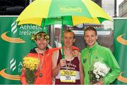 5 August 2013; Winner of the Men's Woodie’s DIY National Half Marathon, Mark Christie, centre, Mullingar Harriers A.C., Co. Westmeath, with second placed  Sean Hehir, right, Rathfarnham W.S.A.F. A.C., Dublin, and third placed Gary O'Hanlon, Clonliffe Harriers, A.C., Dublin. Woodie’s DIY National Half Marathon Championships. Earlsfort Terrace, Dublin. Picture credit: Tomas Greally / SPORTSFILE