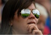 5 August 2013; A general view of a reflected image of the game between Westmeath and Mayo in the sunglasses of a spectator. Electric Ireland GAA Football All-Ireland Minor Championship Quarter-Final, Mayo v Westmeath, O'Connor Park, Tullamore, Co. Offaly. Picture credit: David Maher / SPORTSFILE