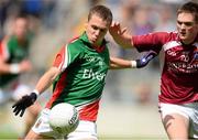 5 August 2013; Michael Plunkett, Mayo, in action against Robert Hickey, Westmeath. Electric Ireland GAA Football All-Ireland Minor Championship Quarter-Final, Mayo v Westmeath, O'Connor Park, Tullamore, Co. Offaly. Picture credit: David Maher / SPORTSFILE