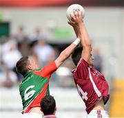 5 August 2013; Conor O'Brien, Westmeath, in action against Stephen Coen, Mayo. Electric Ireland GAA Football All-Ireland Minor Championship Quarter-Final, Mayo v Westmeath, O'Connor Park, Tullamore, Co. Offaly. Picture credit: David Maher / SPORTSFILE